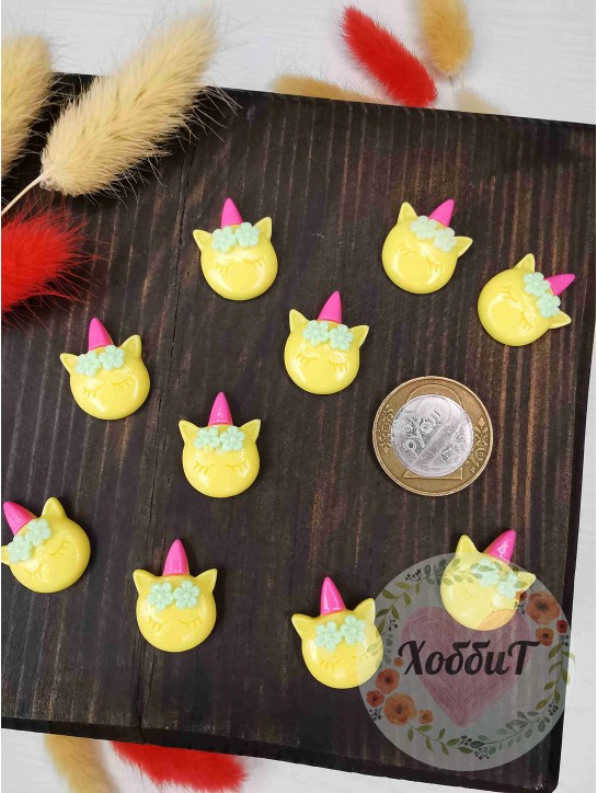 Кабошон "Котенок с рожком" 1,6*2,1см. (желтый)
