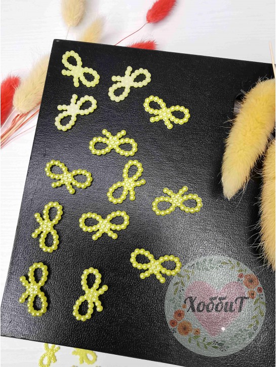 Серединка "Бантик мини" пластик 18*10мм (лимонный), 10штук